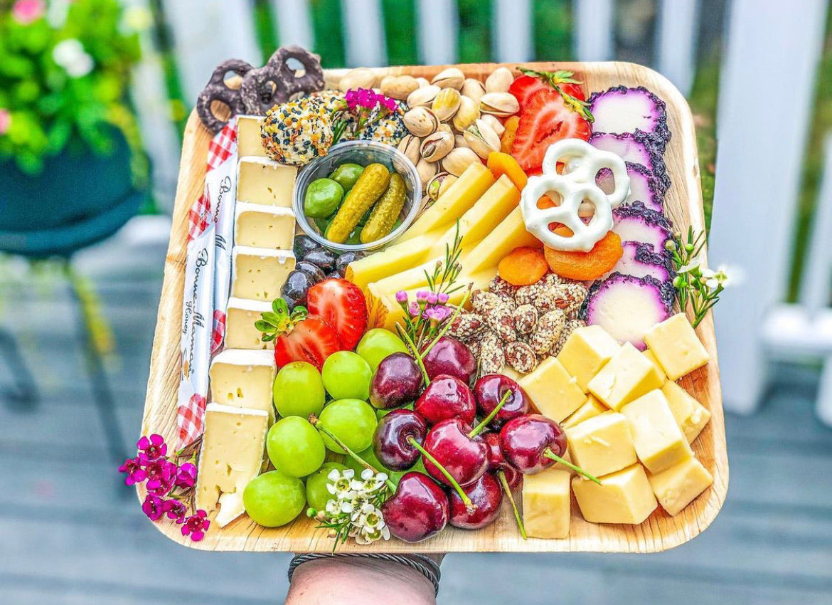 verterra palm plate with charcuterie and pretzels